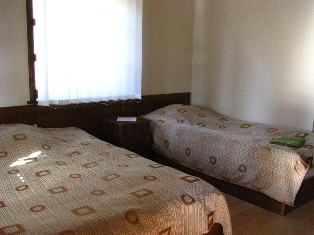 אומלו Guest House Shina חדר תמונה